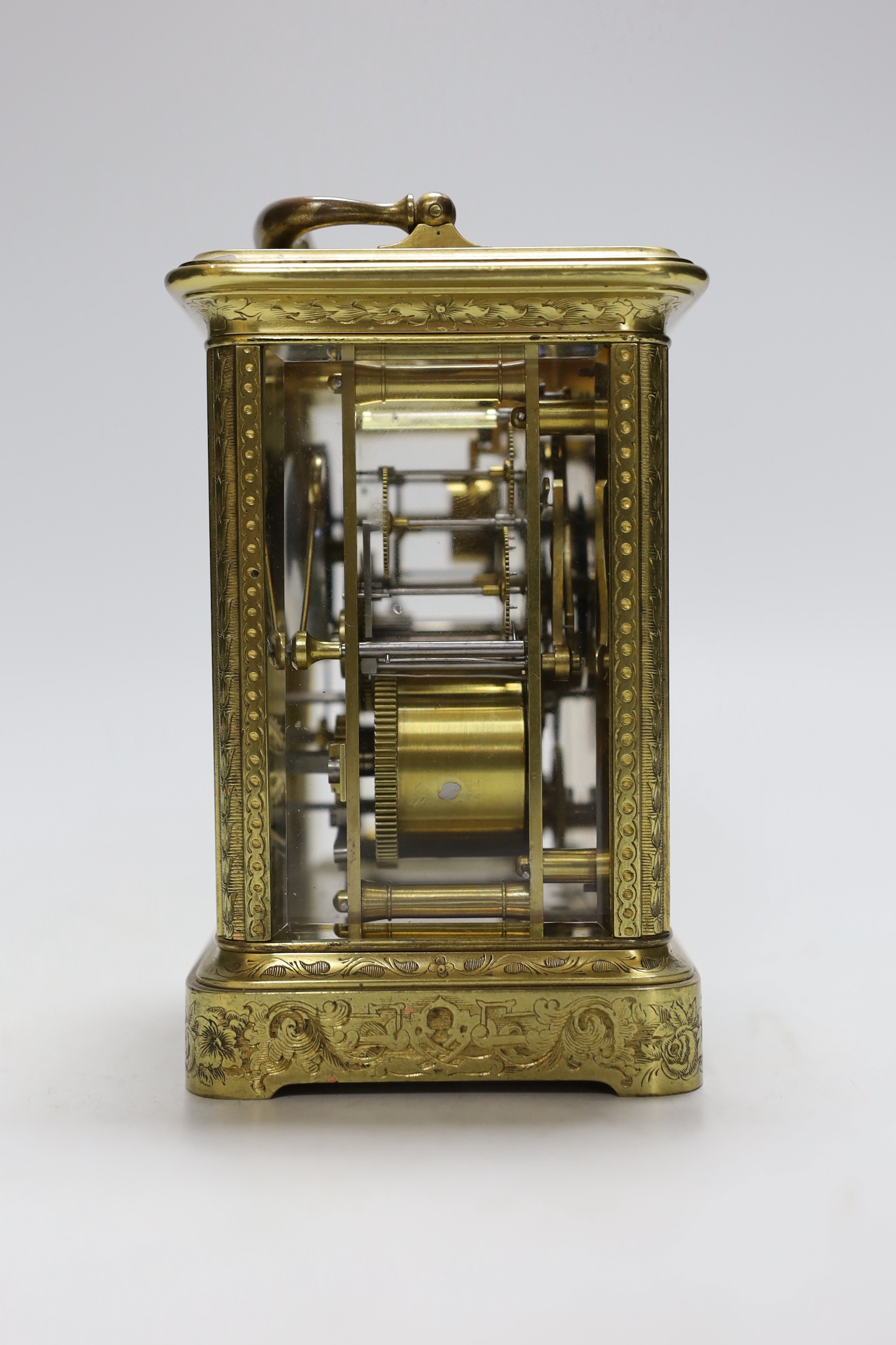 A late 19th century French engraved brass repeating carriage clock with alarm, signed Mottu Freres, Paris, 13cm high